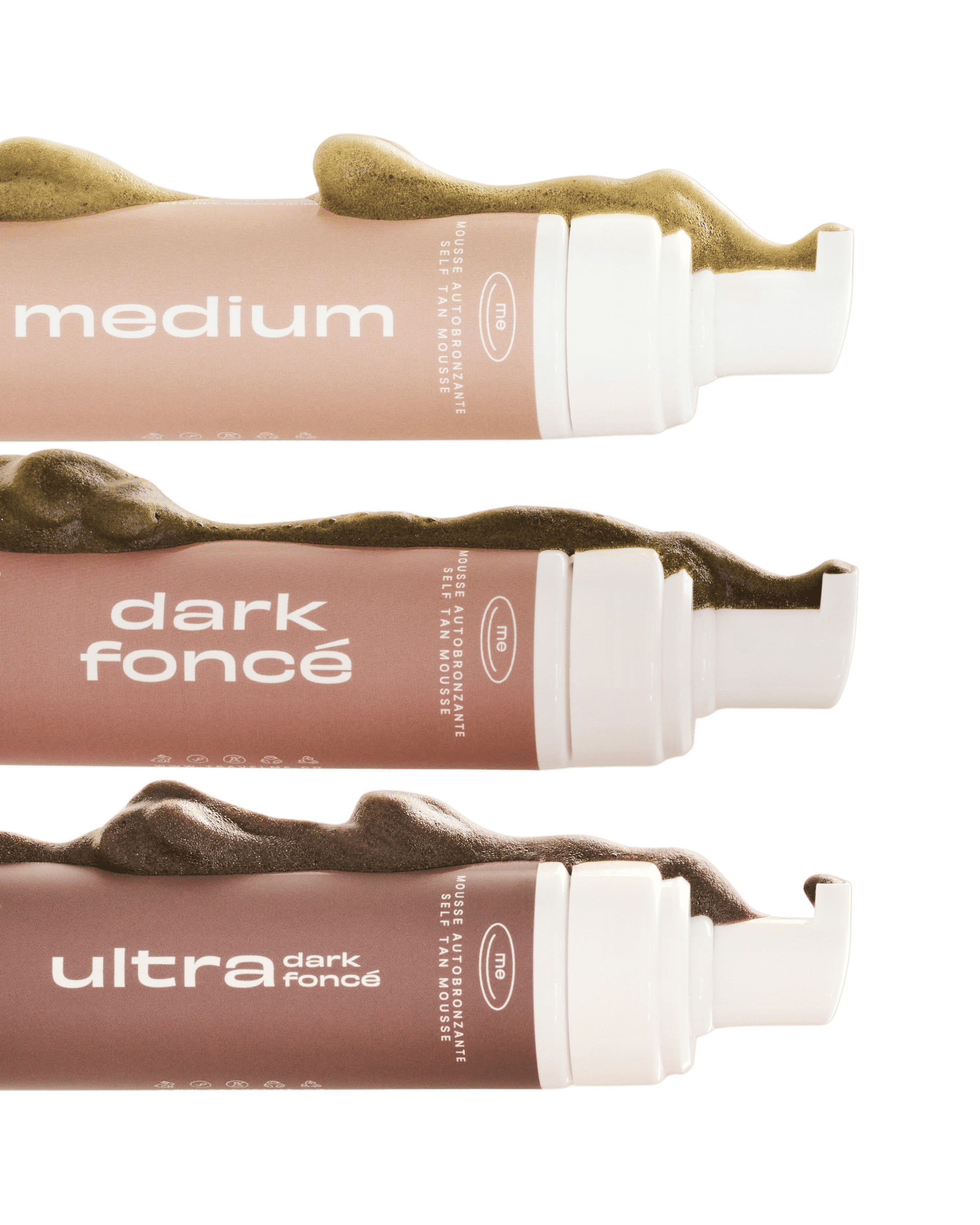 Trois flacons de mousse autobronzante - Médium, Foncée et Ultra foncée - distribuant chacun une mousse assortie à leur étiquette